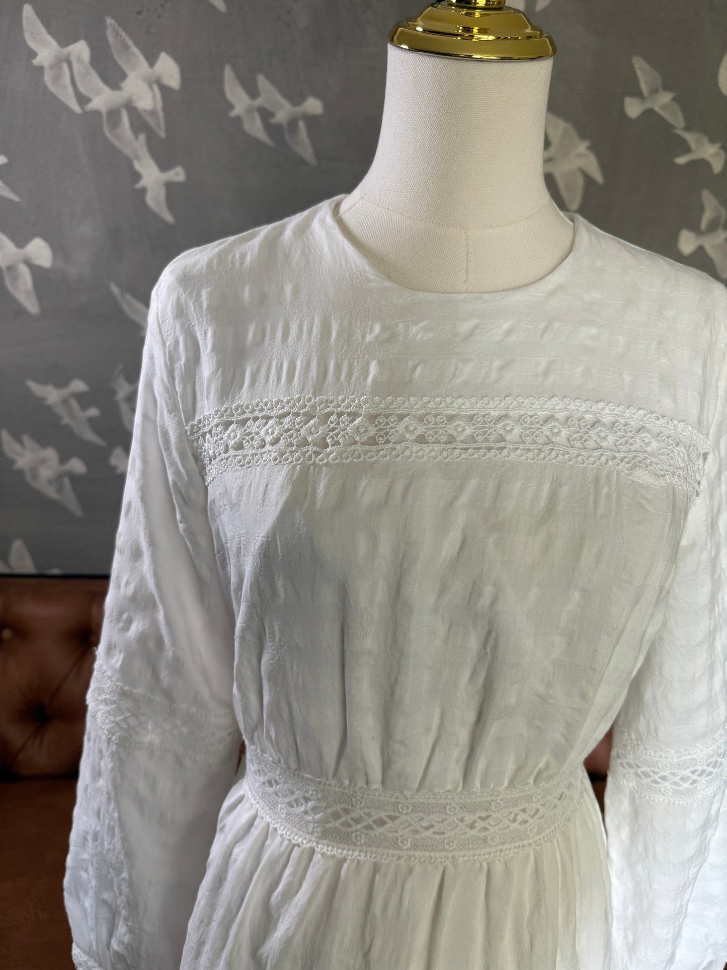 White long sleeved lace trim dress
