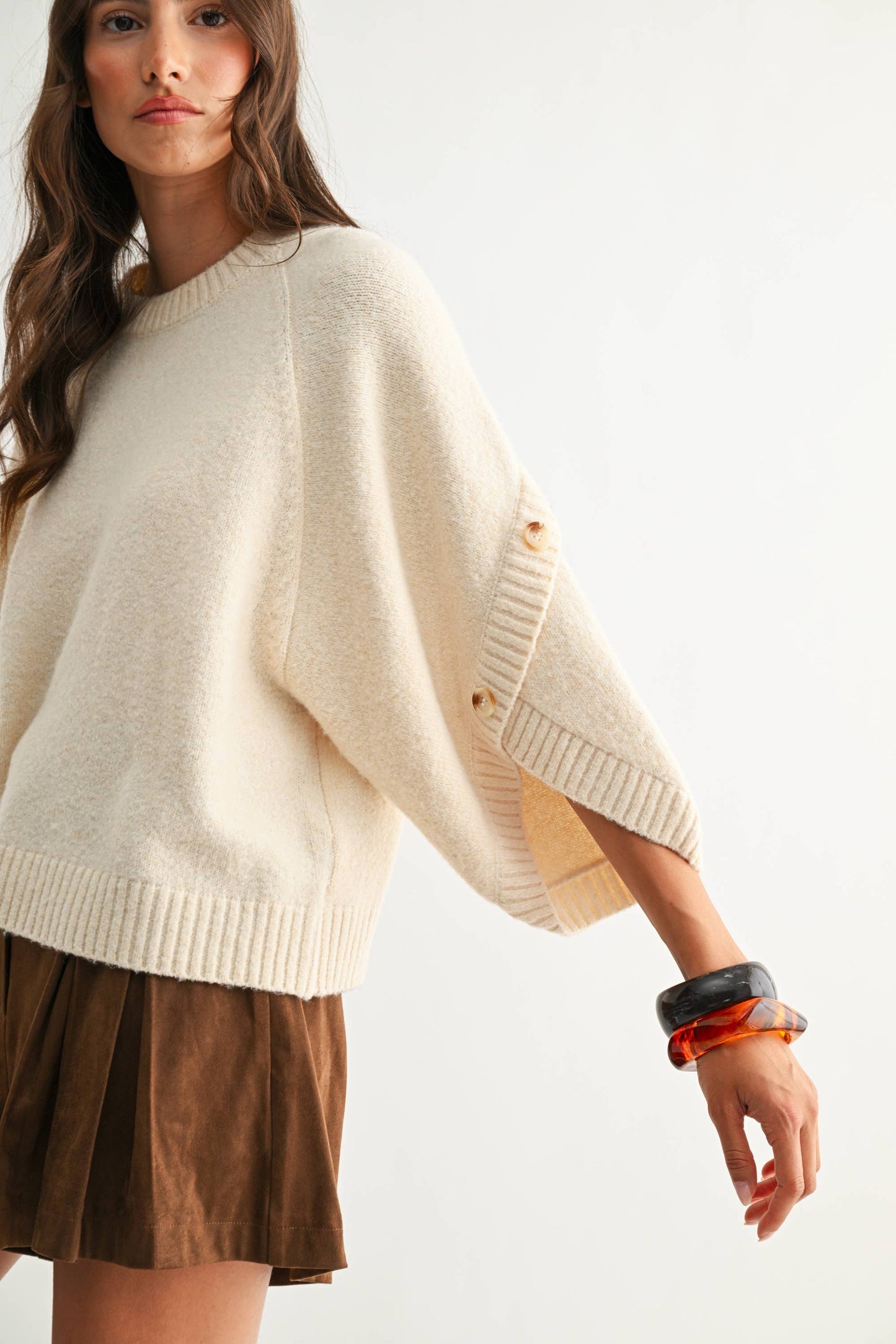 CREAM BUTTON SLEEVE KNIT PULLOVER