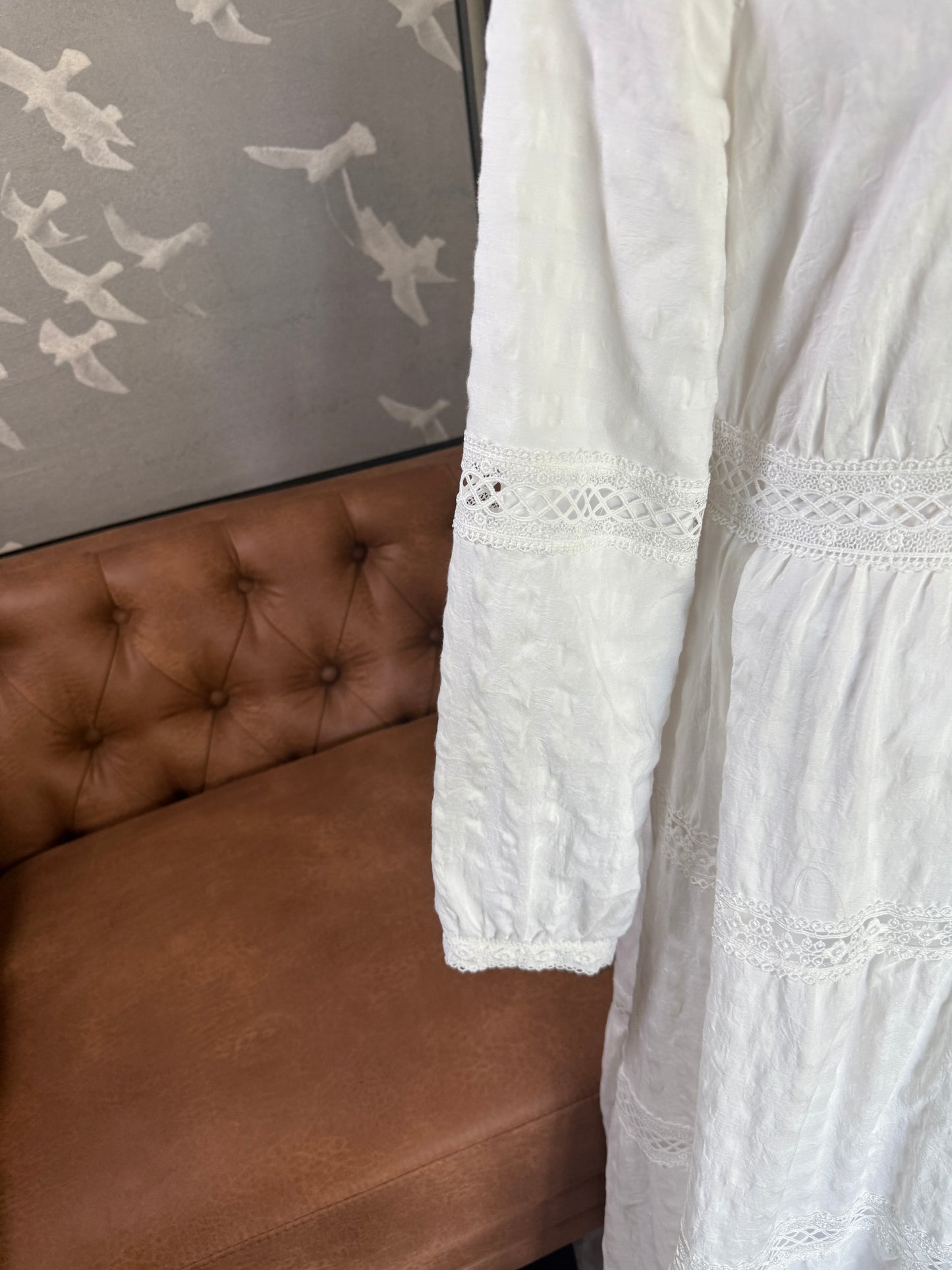 White long sleeved lace trim dress