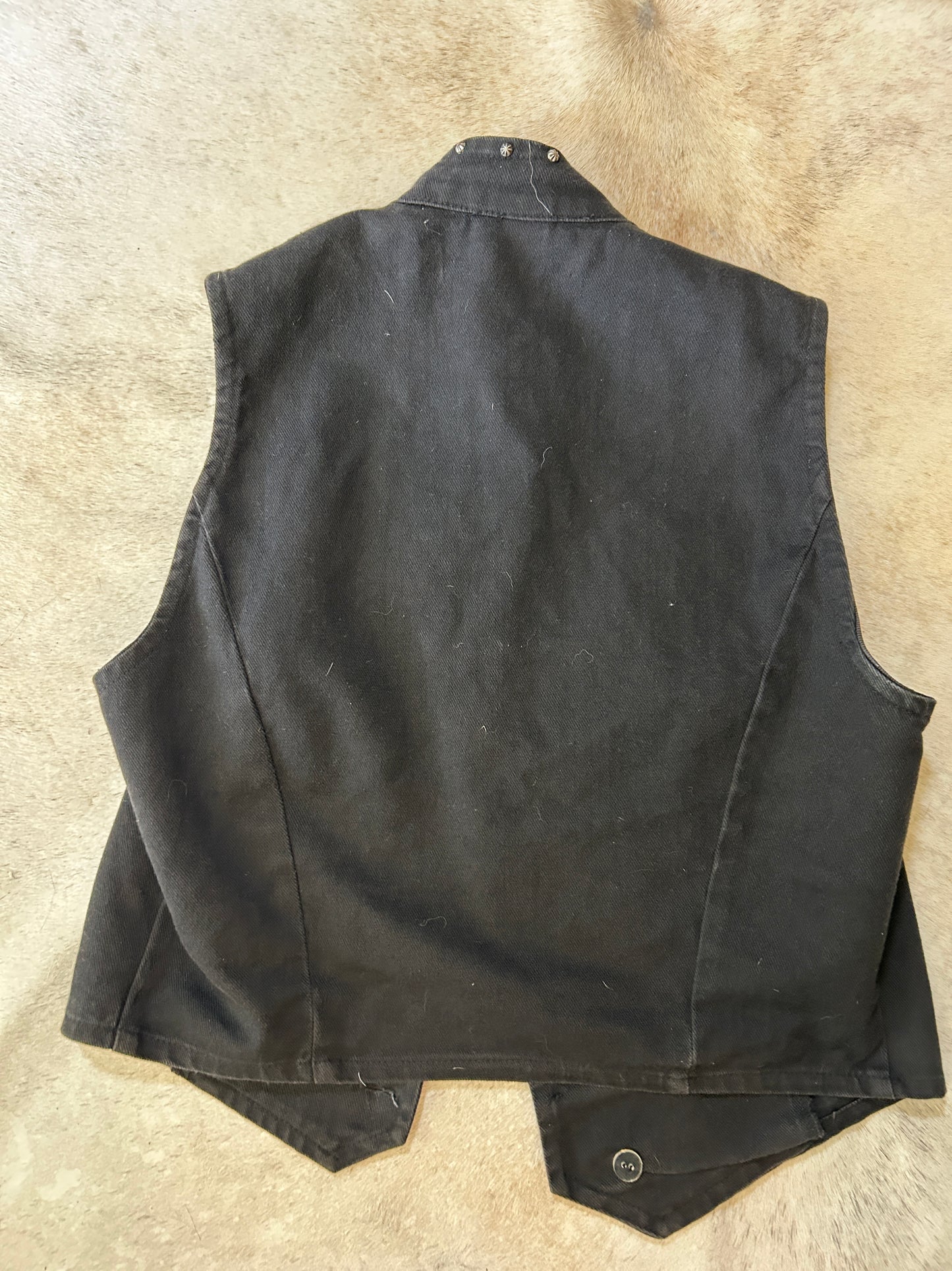 Black jean vest with bone bead detail